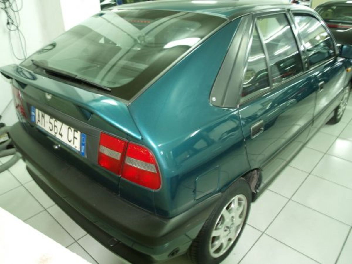 Lancia Delta 1.4 T-Jet 120 CV Argento Ecochic GPL (4)