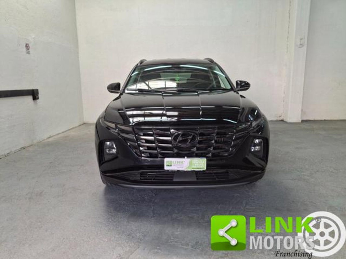 Hyundai Tucson 1.6 hev Exellence 4wd auto (2)