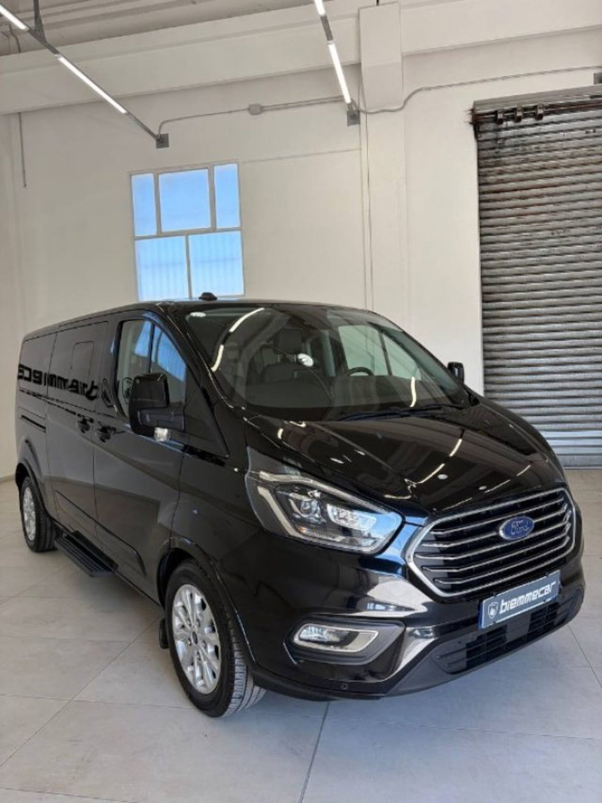 Ford Tourneo Custom 320 2.0 EcoBlue 130CV aut. PL c/sollev. Tit. (2)